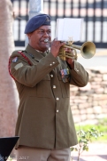 Lance Bombardier Regan Daniels of the Cape Field Artillery regiment plays the Last Post and the Reveille
