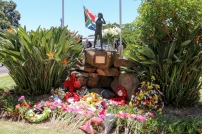 Wreaths and flowers at the Peter Pan statue